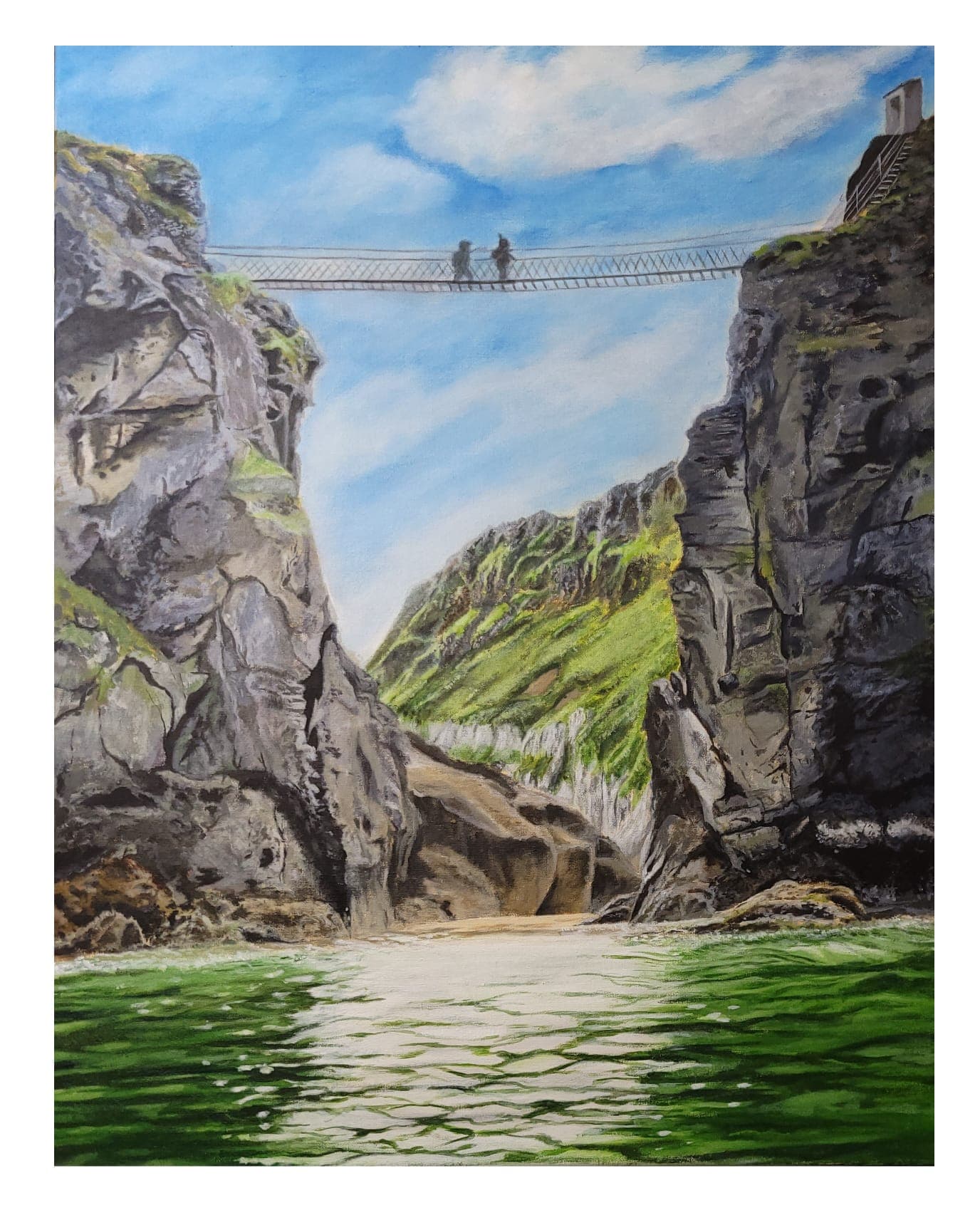 The Carrick-a-Rede rope bridge slung between sea cliffs above green water